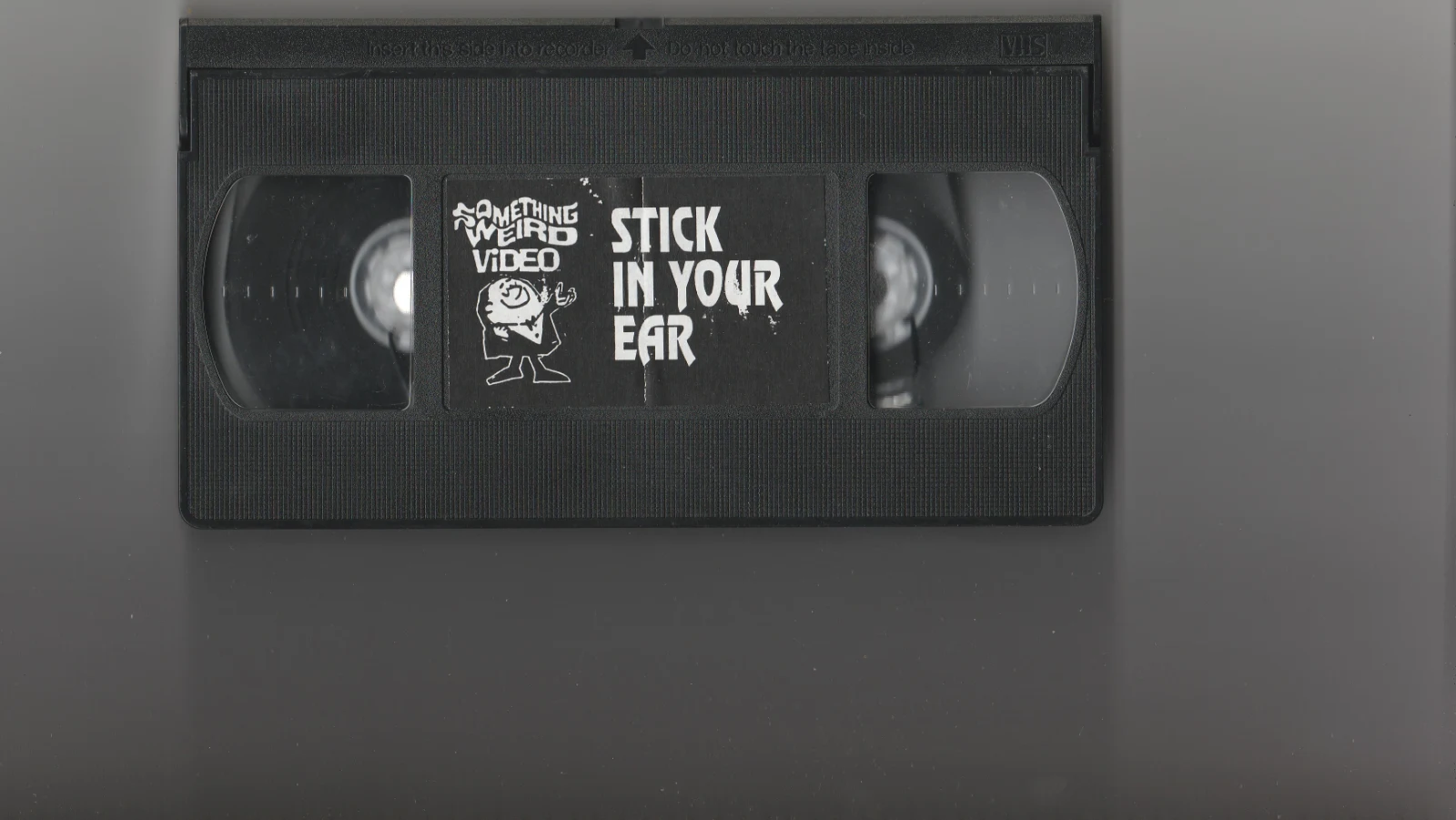 Stick It in Your Ear VHS front label scan